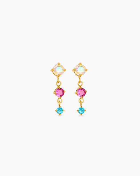 Pair of gold earrings with colorful gemstones on a white background